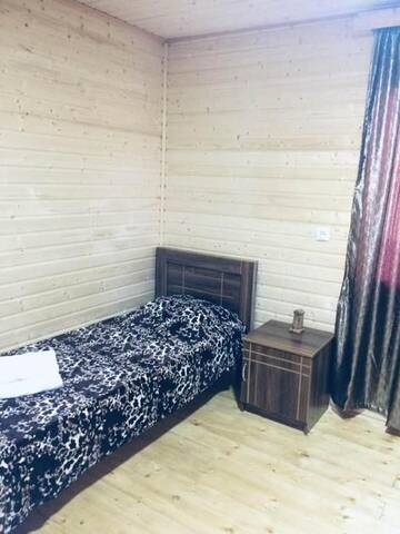 Фото номера Двухместный номер Делюкс с 2 отдельными кроватями Лоджи Ushba Cottages г. Mazeri 11